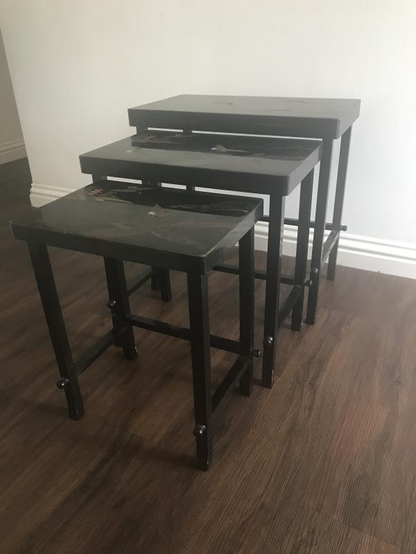 Vintage black lacquered Japanese nesting tables.