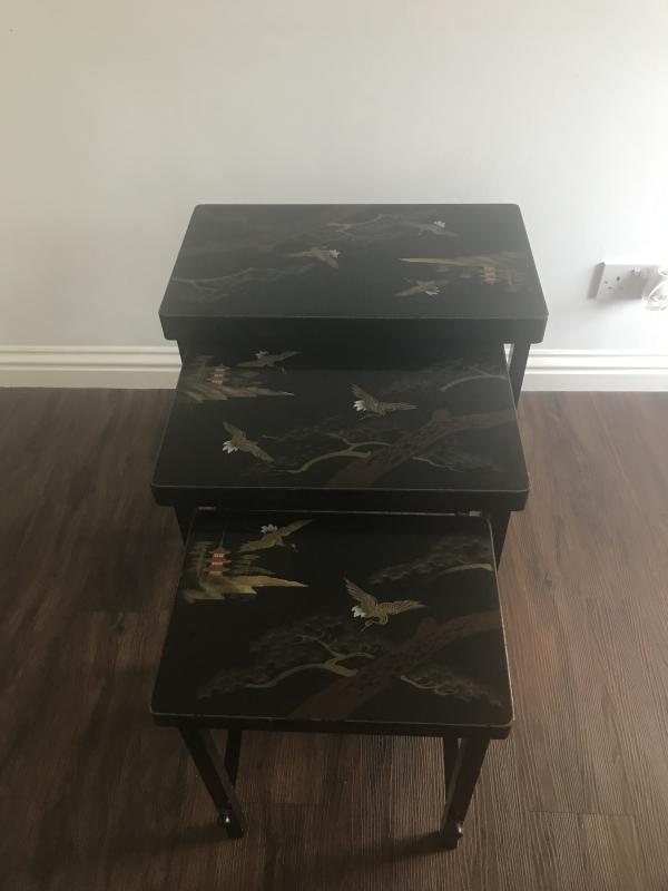 Vintage black lacquered Japanese nesting tables.