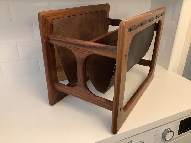 Mid century Danish magazine rack by Aksel Kjersgaard.
